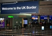 UK reimposes quarantine for travelers from Belgium and Bahamas spike in cases