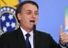 Brazilian President Jair Bolsonaro threatens WHO exit as coronavirus kills one Brazilian per minute