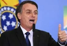 Brazilian President Jair Bolsonaro threatens WHO exit as coronavirus kills one Brazilian per minute