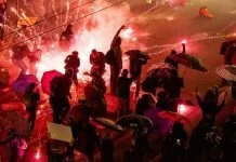 Man shot by gunman drives car in Seattle